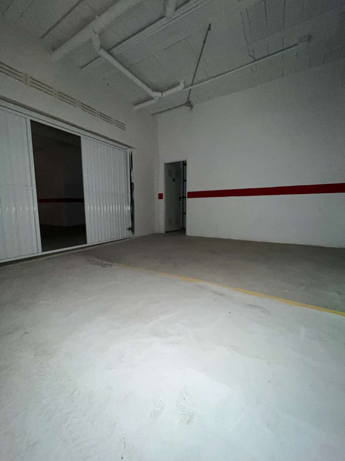 Large closed garage for 2 cars with storage room
