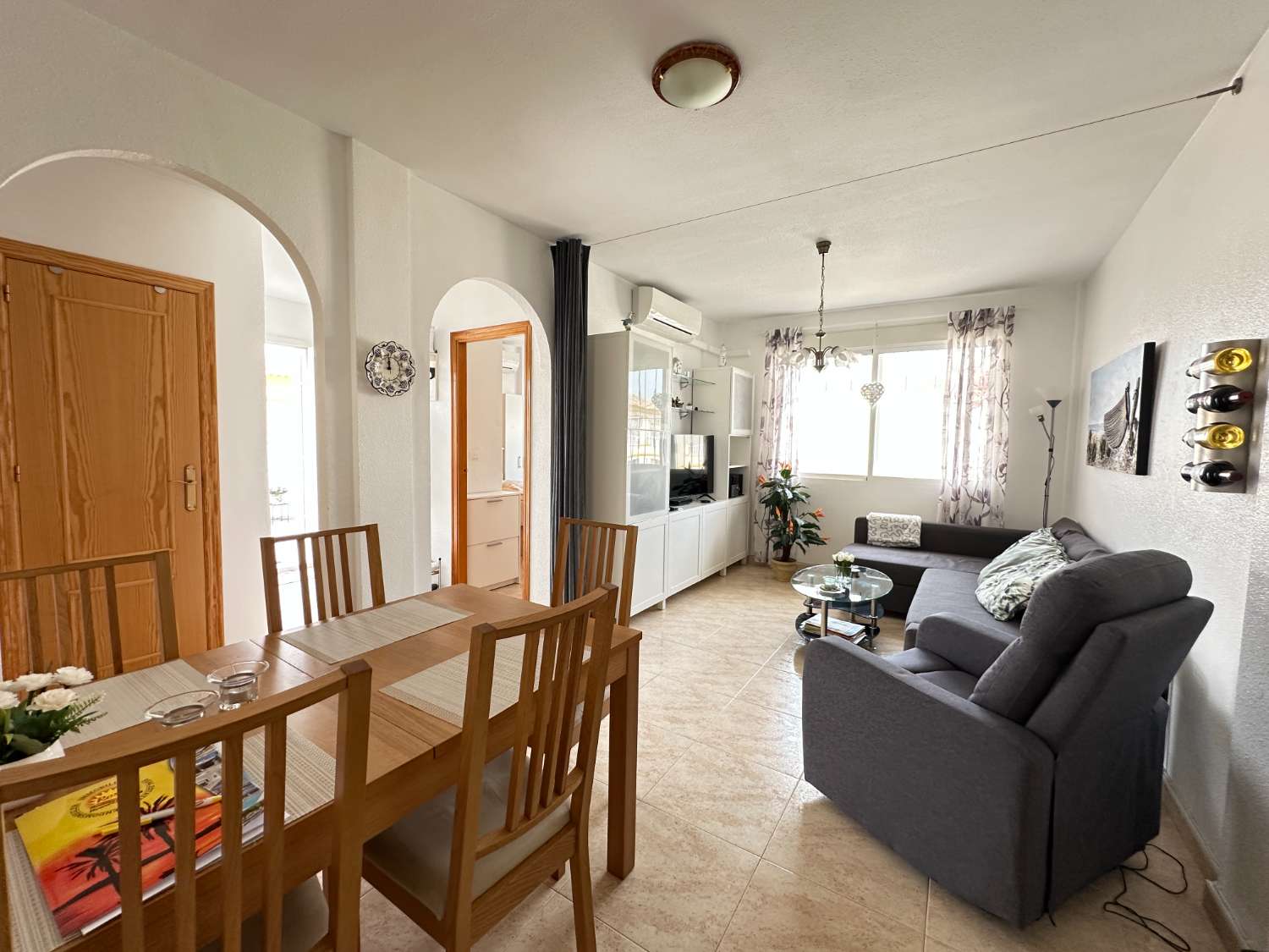 Apartamento en planta alta con jardín en Playa Flamenca