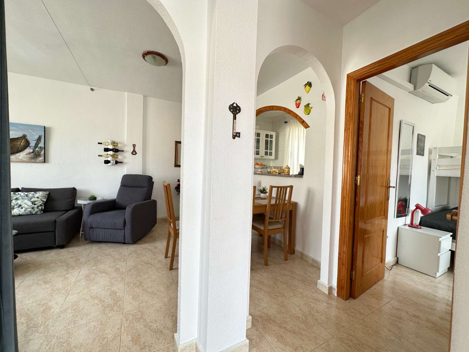 Apartamento en planta alta con jardín en Playa Flamenca