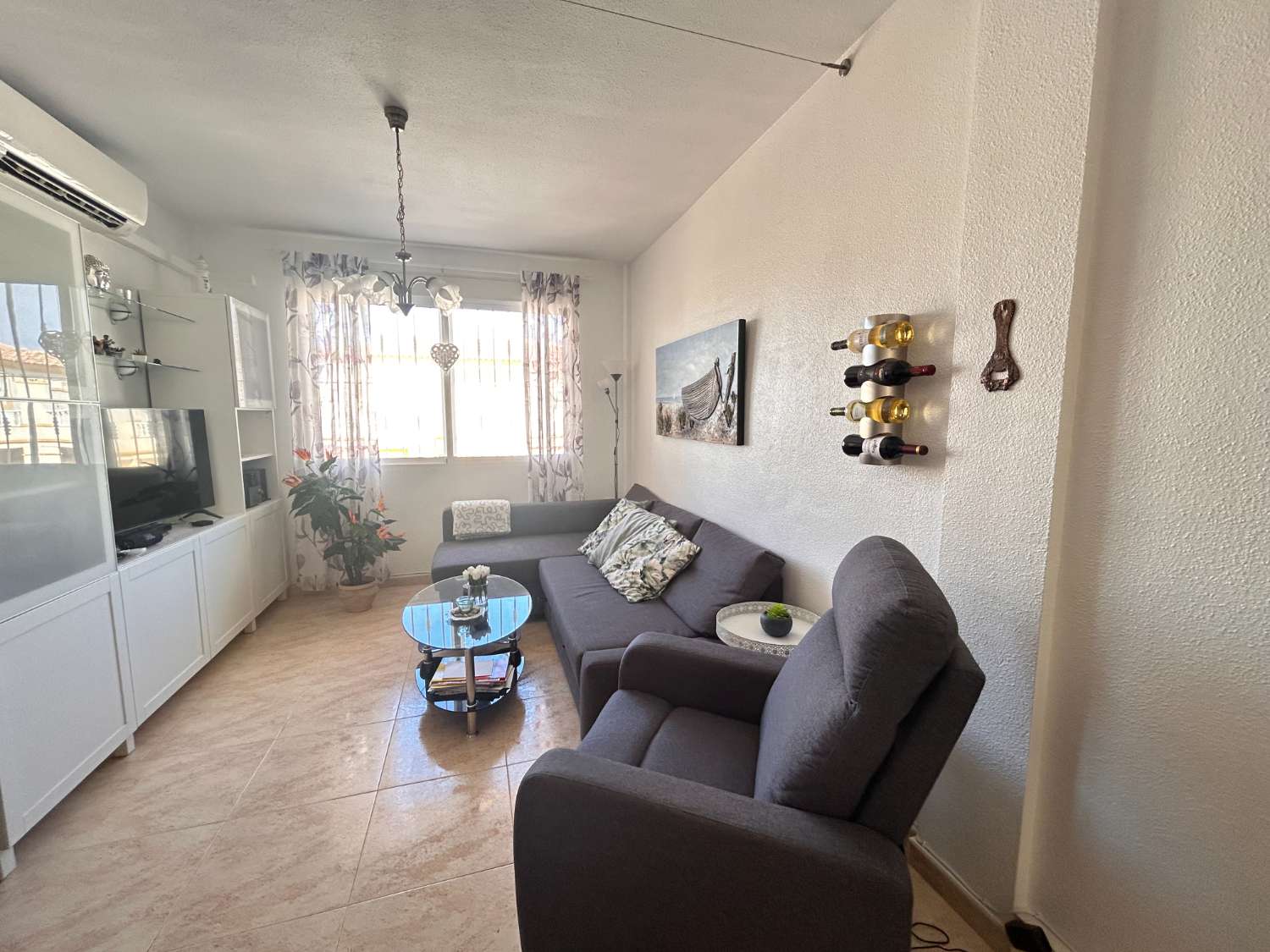 Apartamento en planta alta con jardín en Playa Flamenca