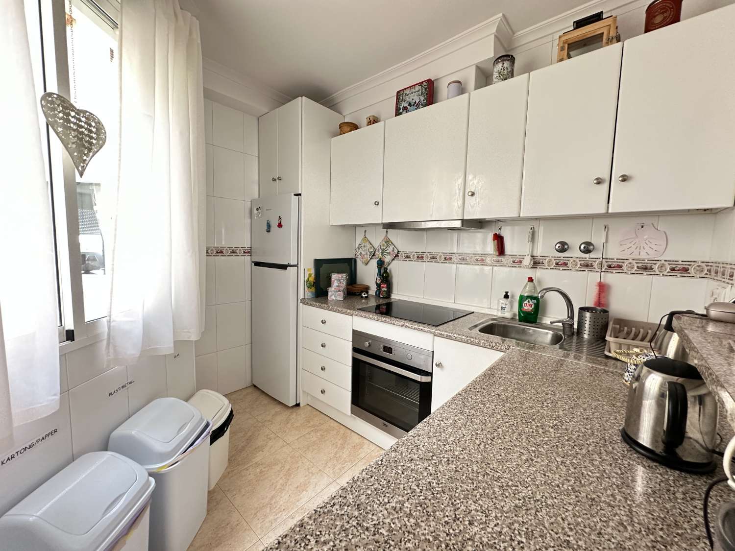 Apartamento en planta alta con jardín en Playa Flamenca