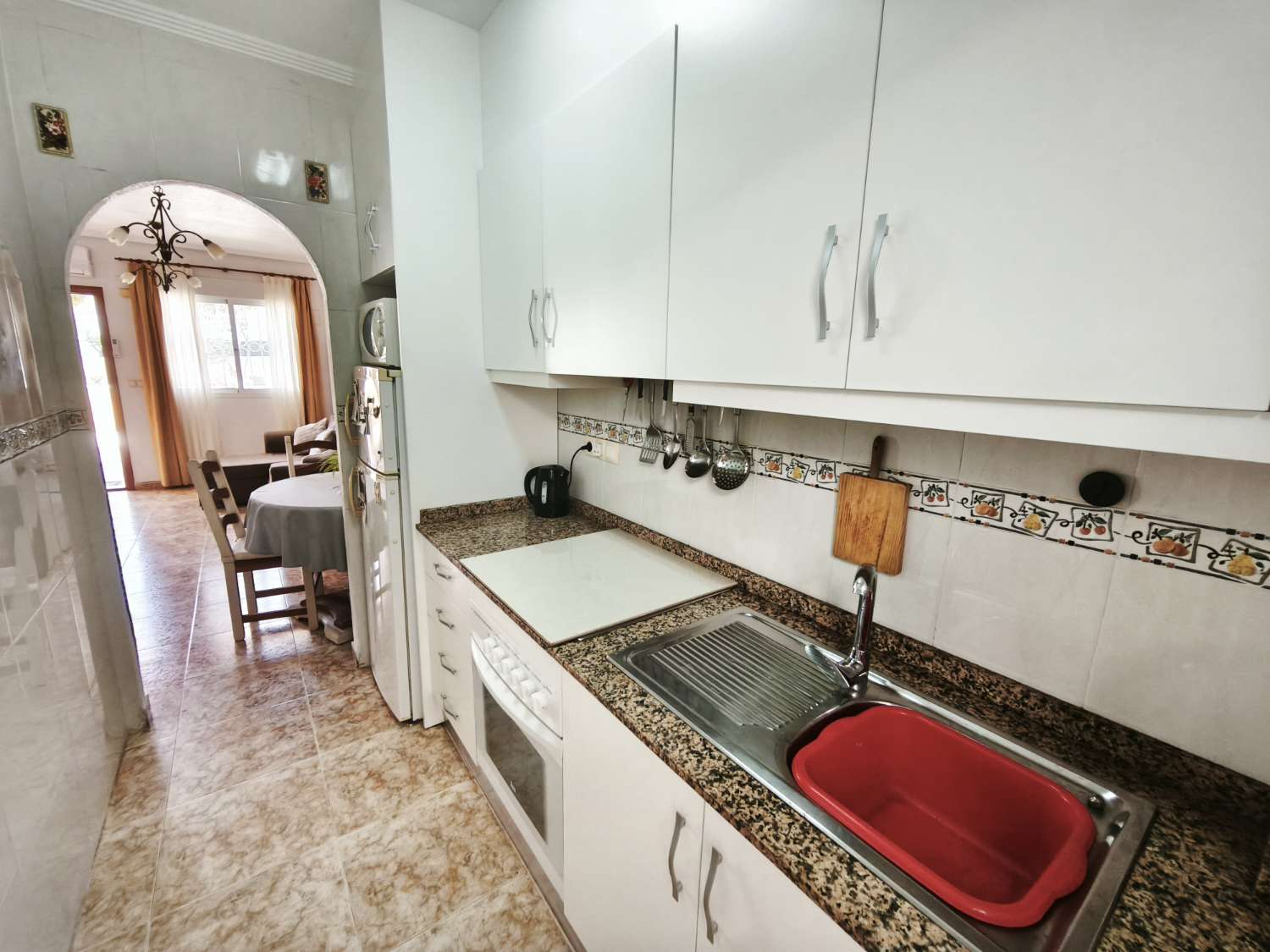 Appartement au rez-de-chaussée à Punta Prima avec 2 chambres et 1 salle de bain.