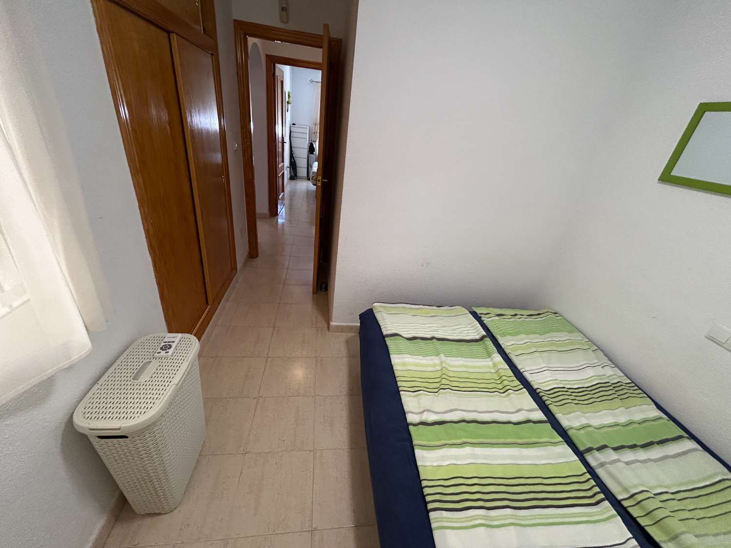 Bonito y acogedor apartamento en la planta baja con 2 dormitorios y 1 baño.
