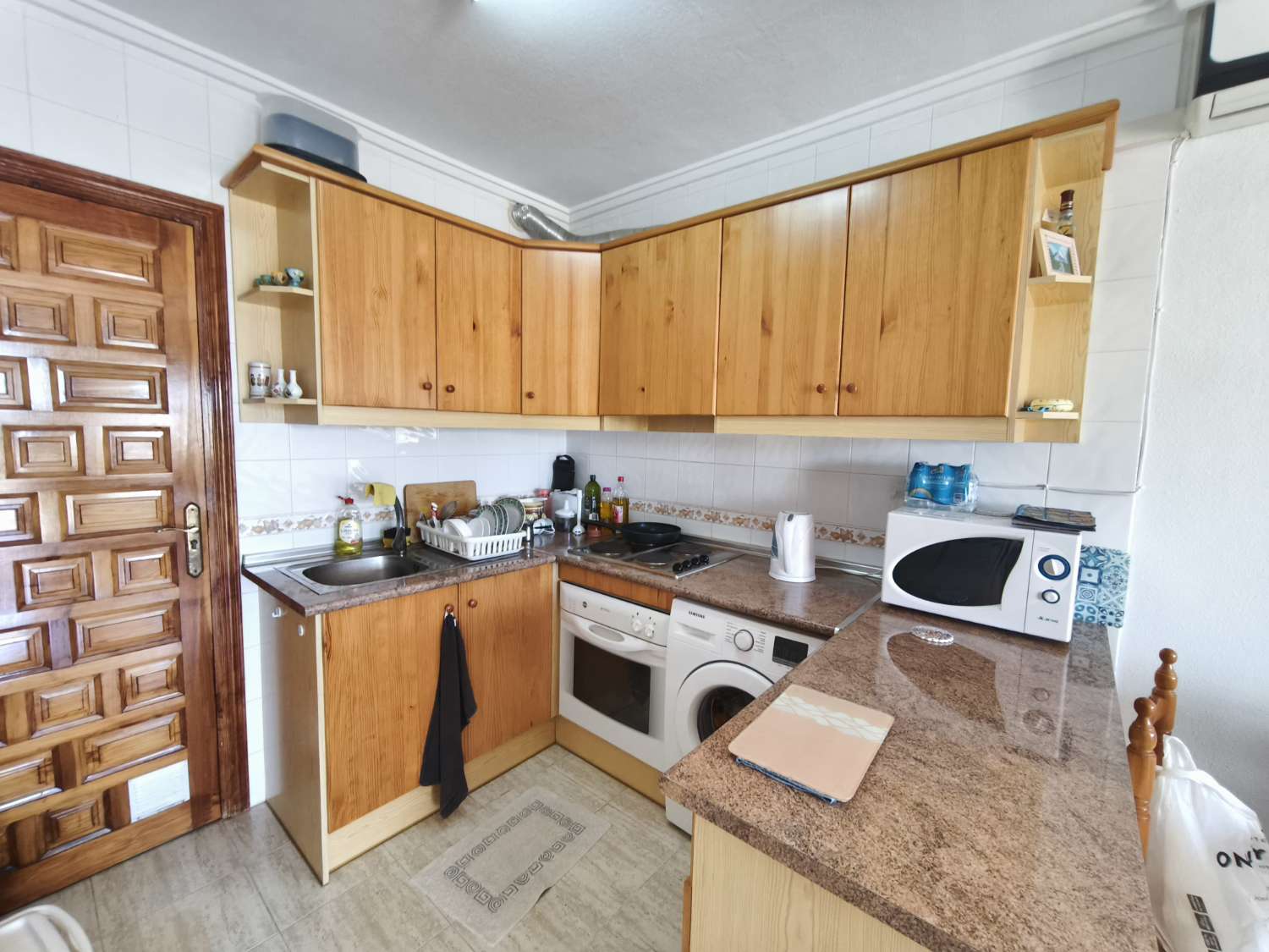 Lägenhet på översta våningen med 2 sovrum och privat solarium