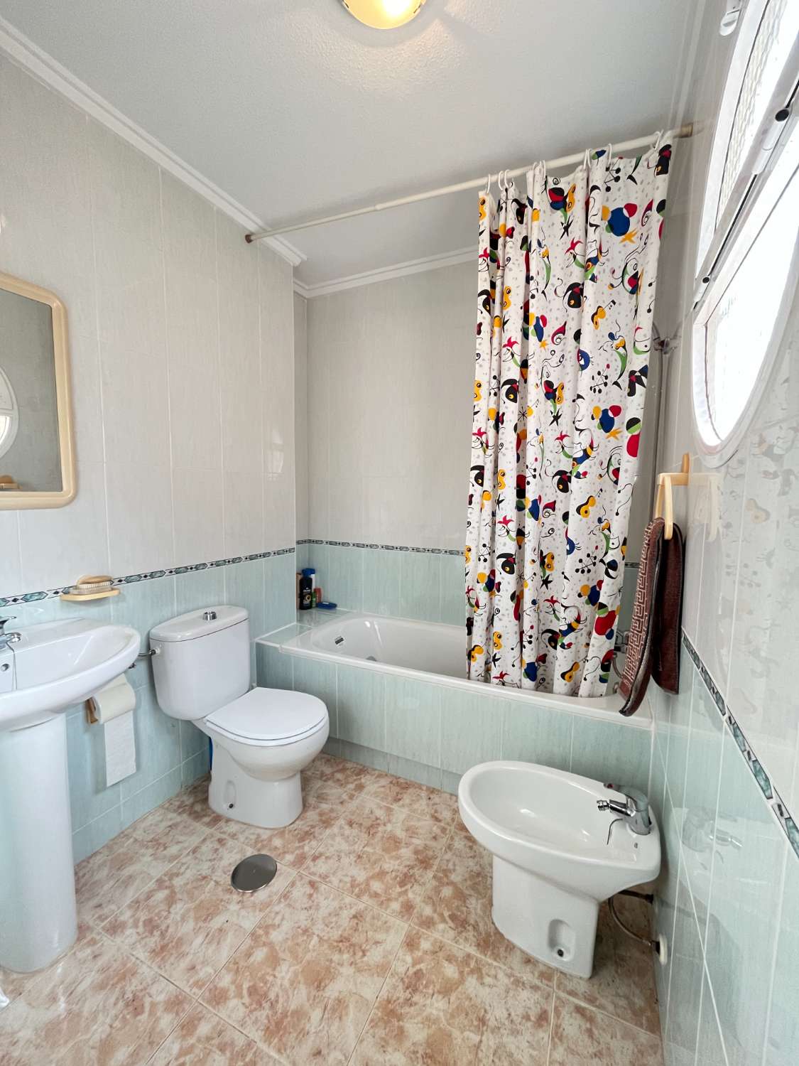 Casa de 2 dormitorios con piscina comunitaria en Playa Flamenca