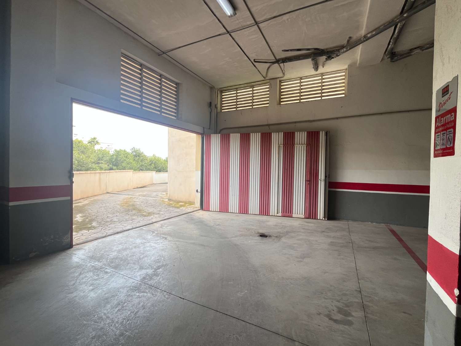 Spacious and perfect garage space with storage room