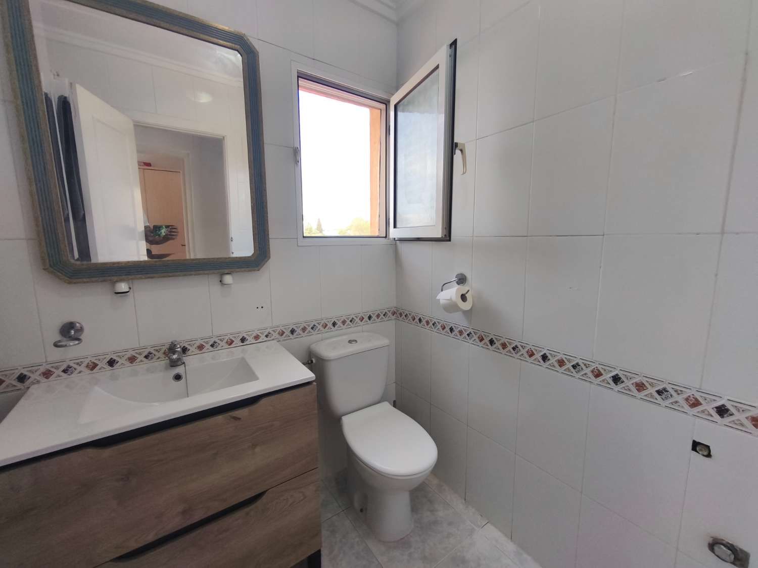 Encantador apartamento de tres dormitorios