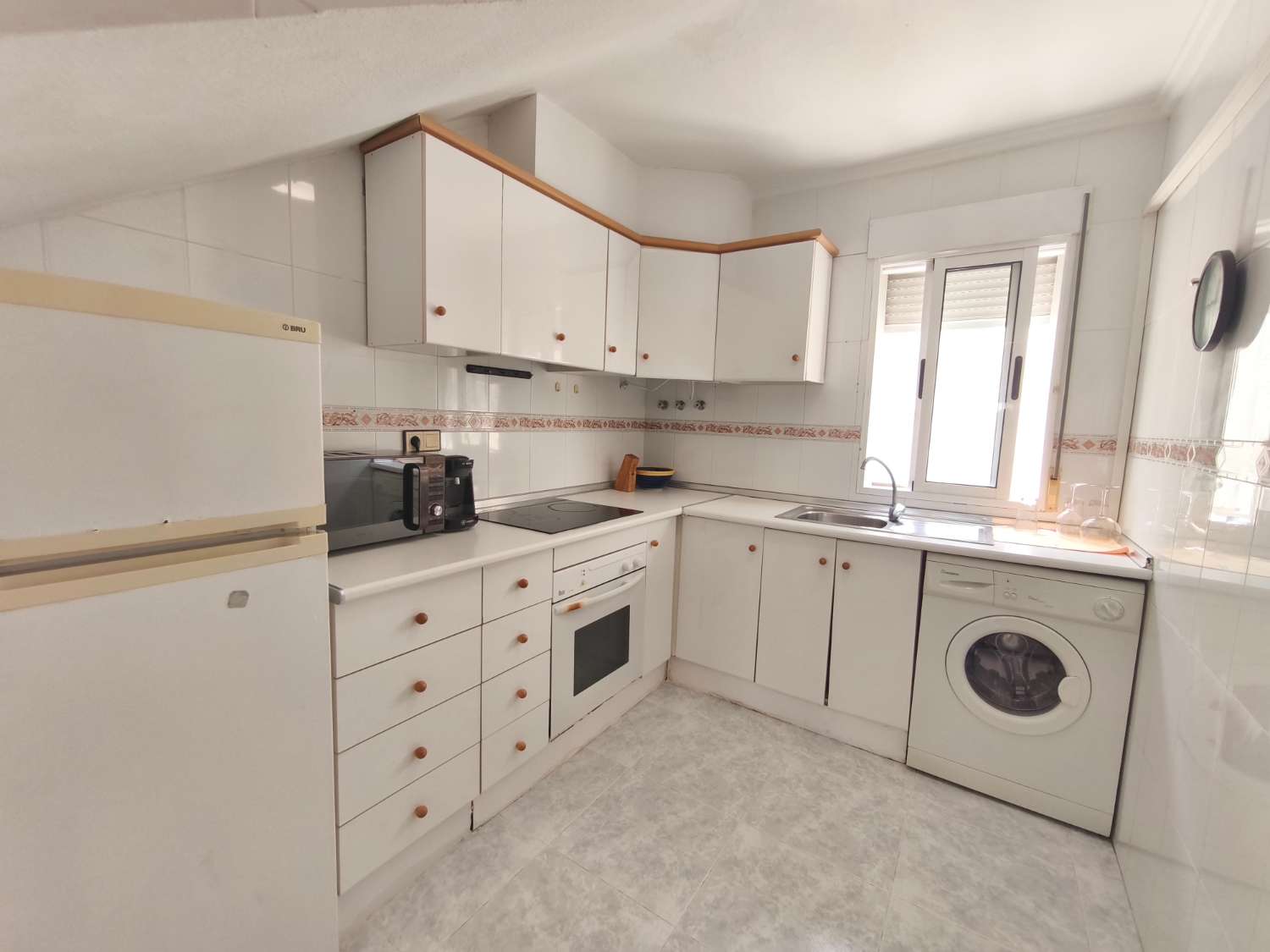 Encantador apartamento de tres dormitorios