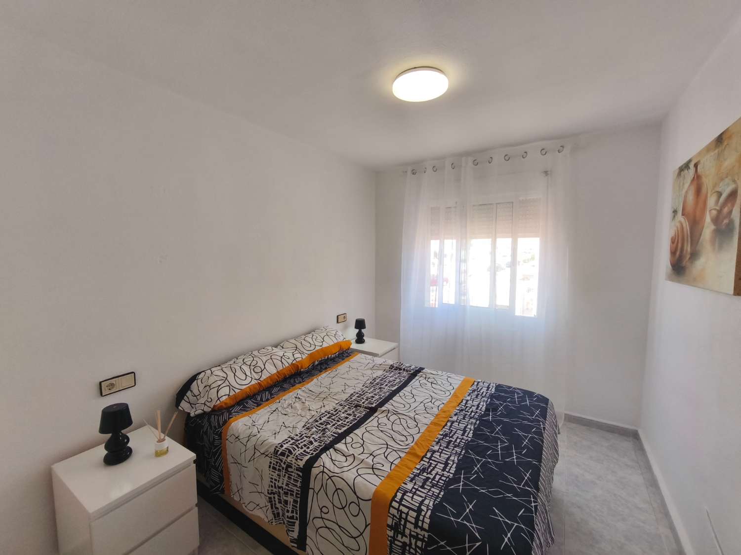 Encantador apartamento de tres dormitorios