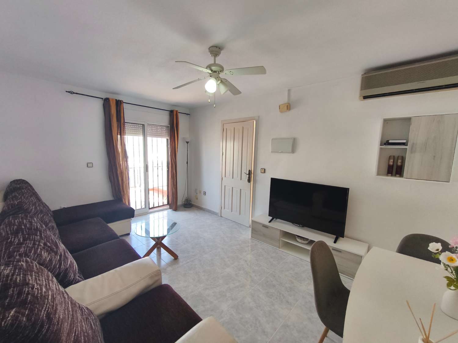 Encantador apartamento de tres dormitorios