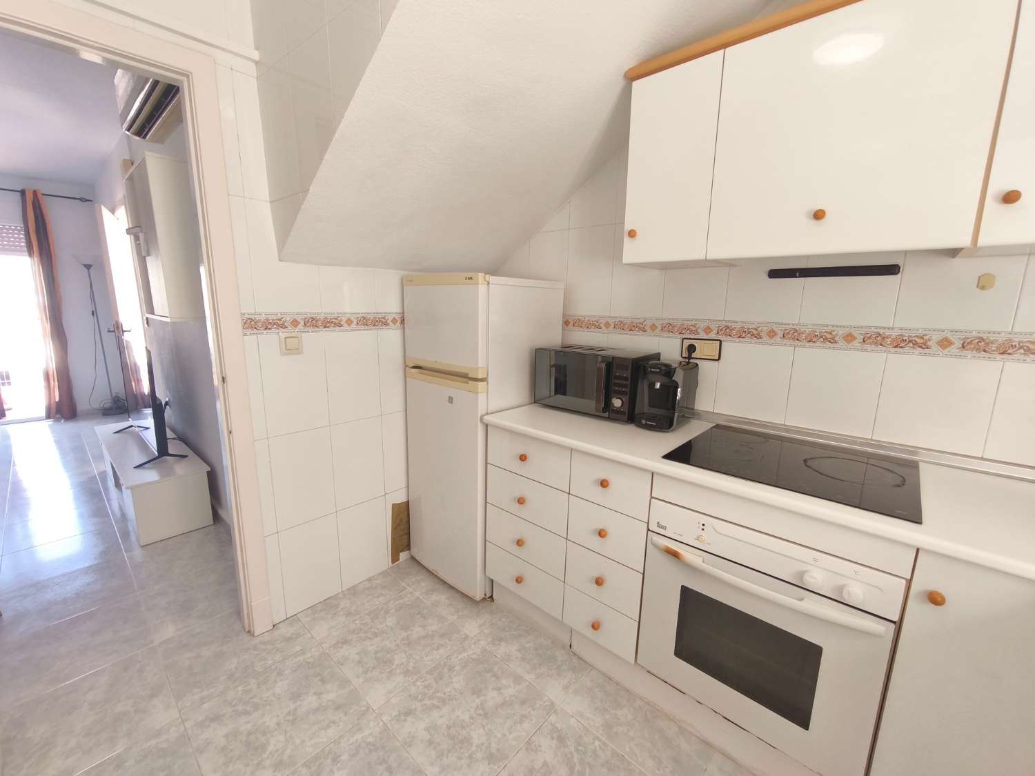 Encantador apartamento de tres dormitorios
