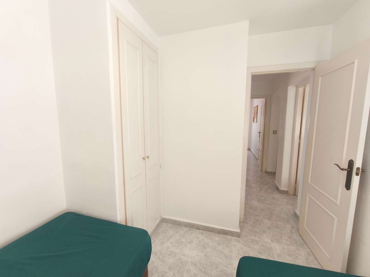 Encantador apartamento de tres dormitorios