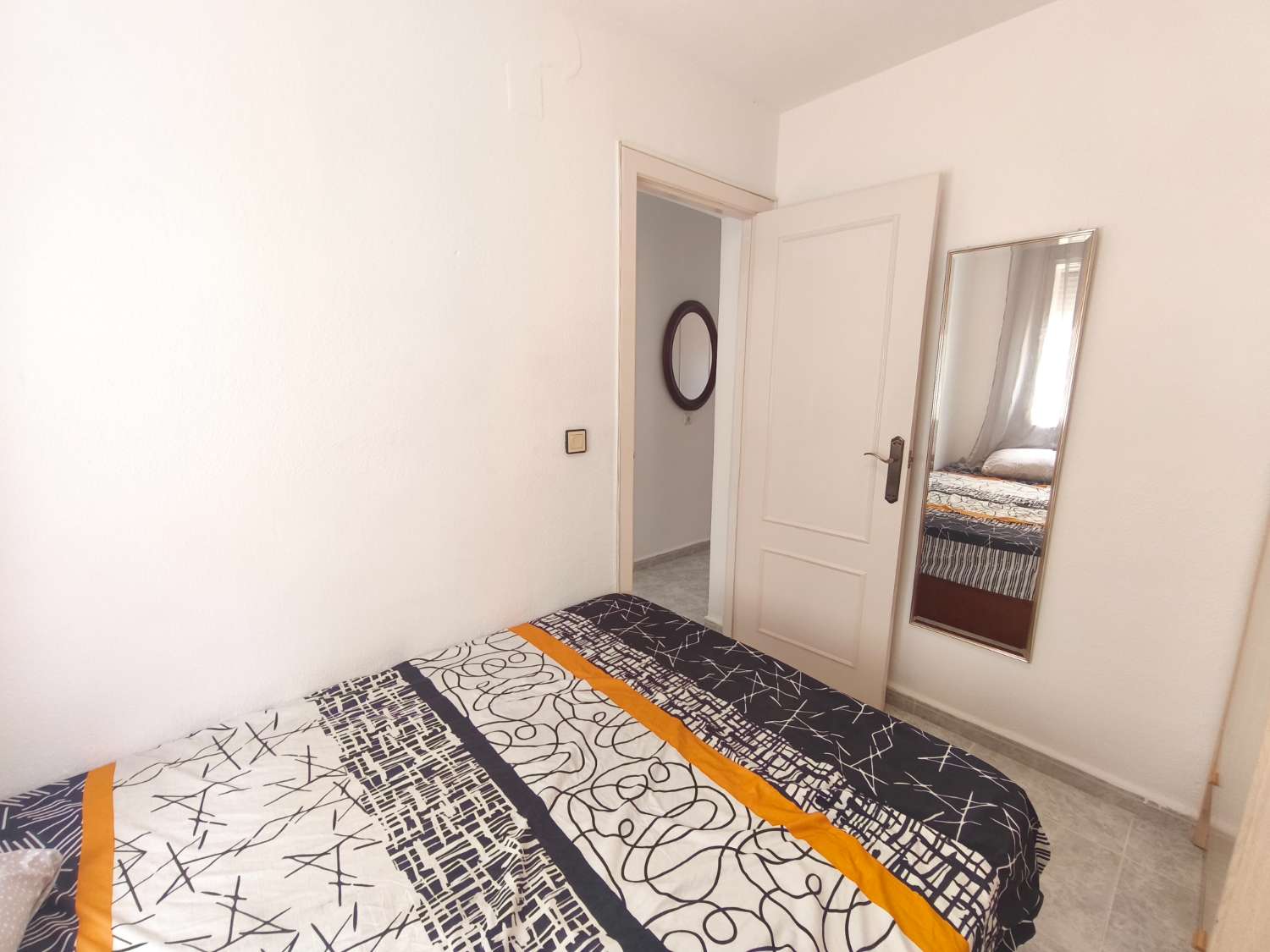 Encantador apartamento de tres dormitorios