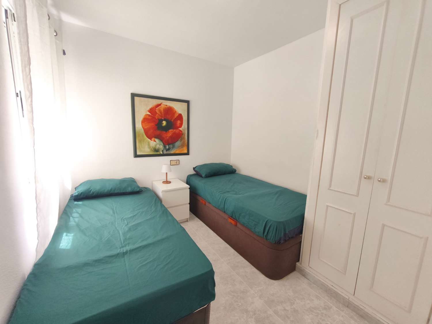Encantador apartamento de tres dormitorios