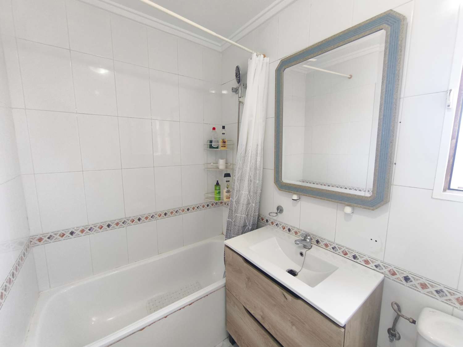 Encantador apartamento de tres dormitorios