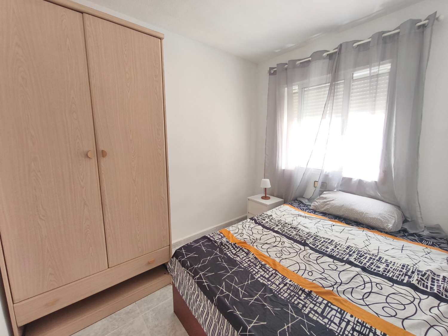 Encantador apartamento de tres dormitorios