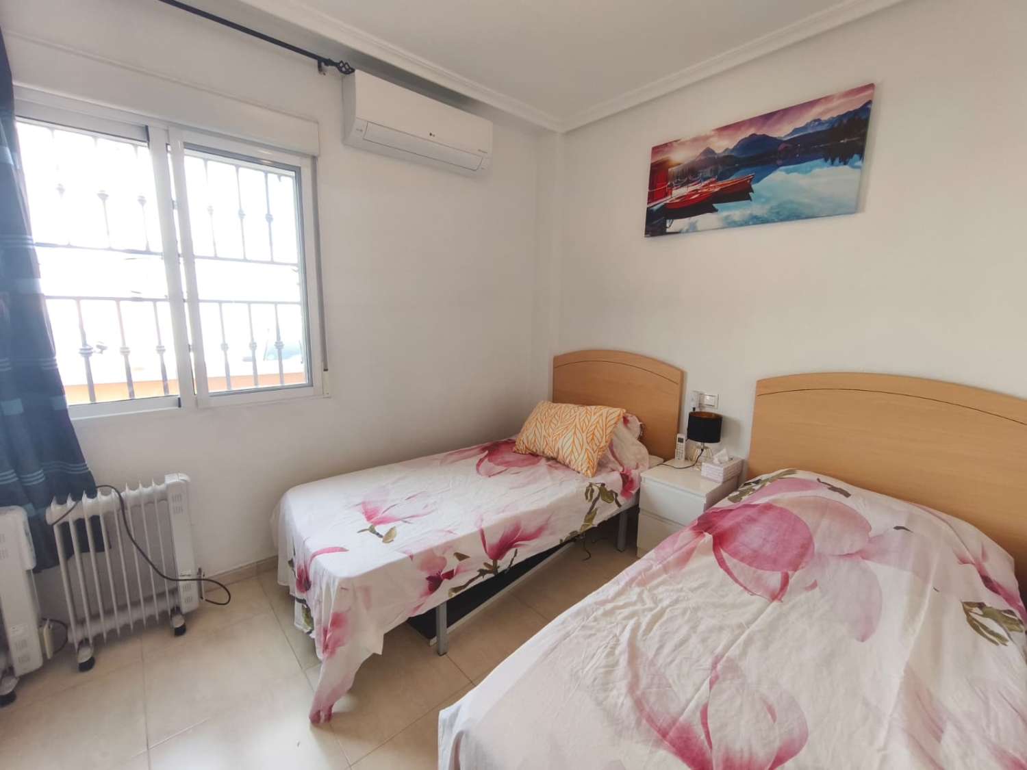 Acogedora vivienda en planta baja de 2 dormitorios y 2 baños