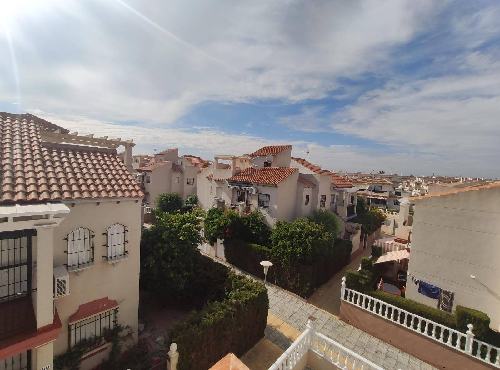 Top floor apartment with 2 bedrooms, 1 bathroom and communal pool.